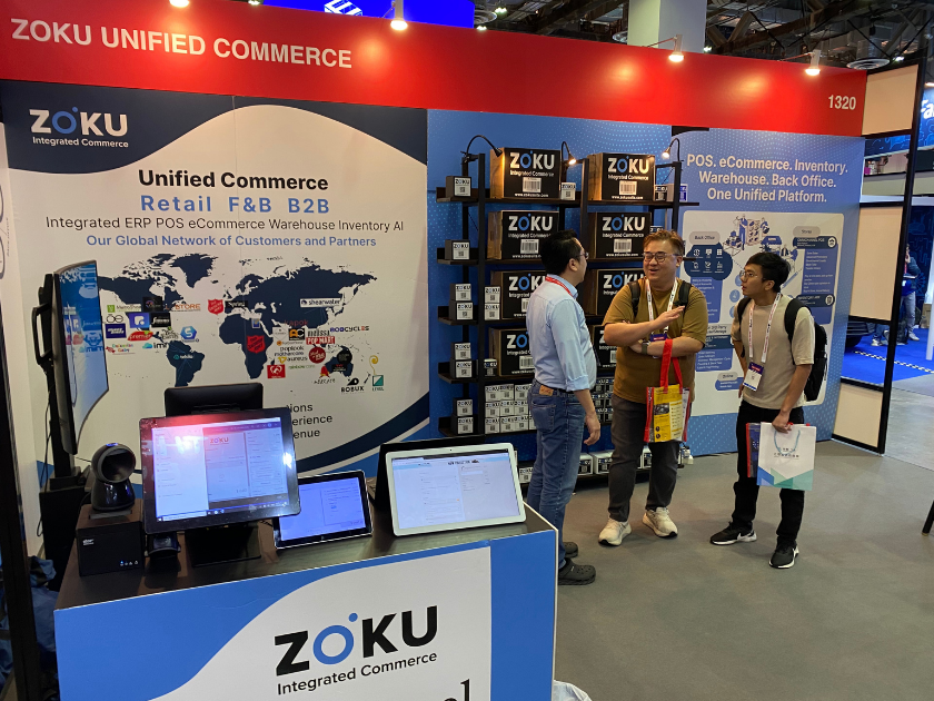 Trade show booth with technology displays.