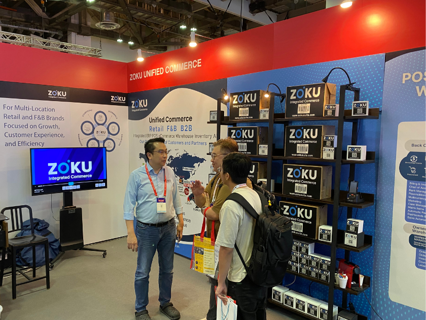 Trade show booth with products displayed.